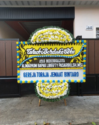 Papan Bunga Duka di Pakpak Bharat